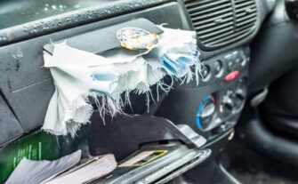 Dashboard of car with Takata airbag after being deployed
